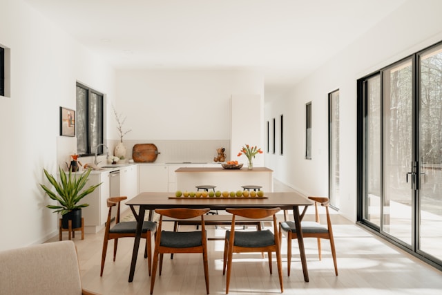 rectangular dining table in an open-plan kitchen and living room showing clear traffic flow around the table