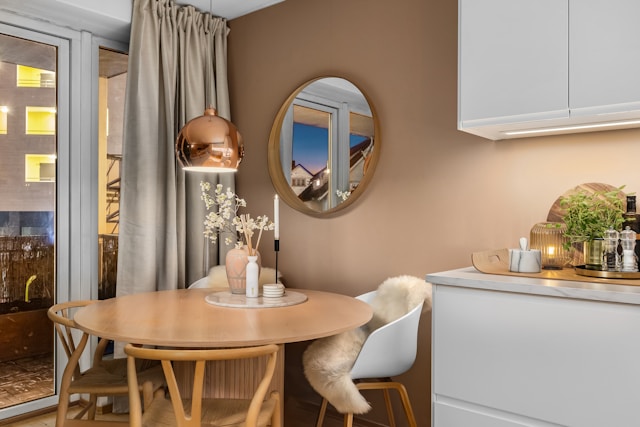 small kitchen with a compact rectangular dining table and two chairs for apartment living