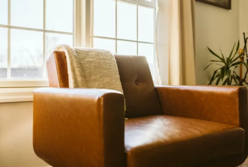 a brown leather chair