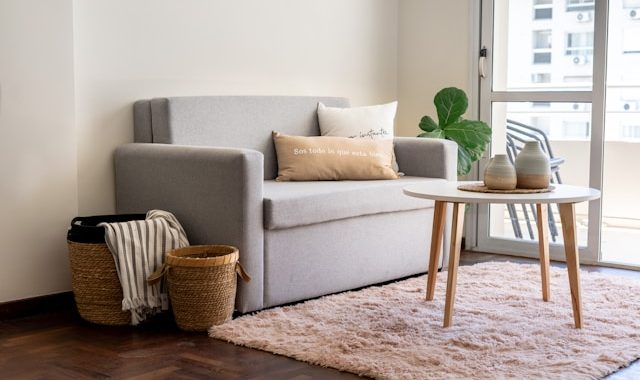 a sofa and coffee table in the living room