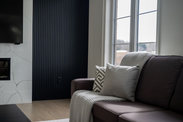 modern living room with a brown leather recliner sofa