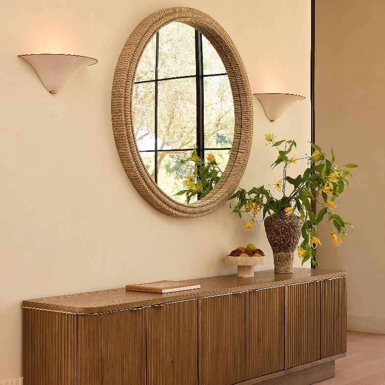 CB2 Davison 93" Fluted Oak Media Console with storage and some decorations on top