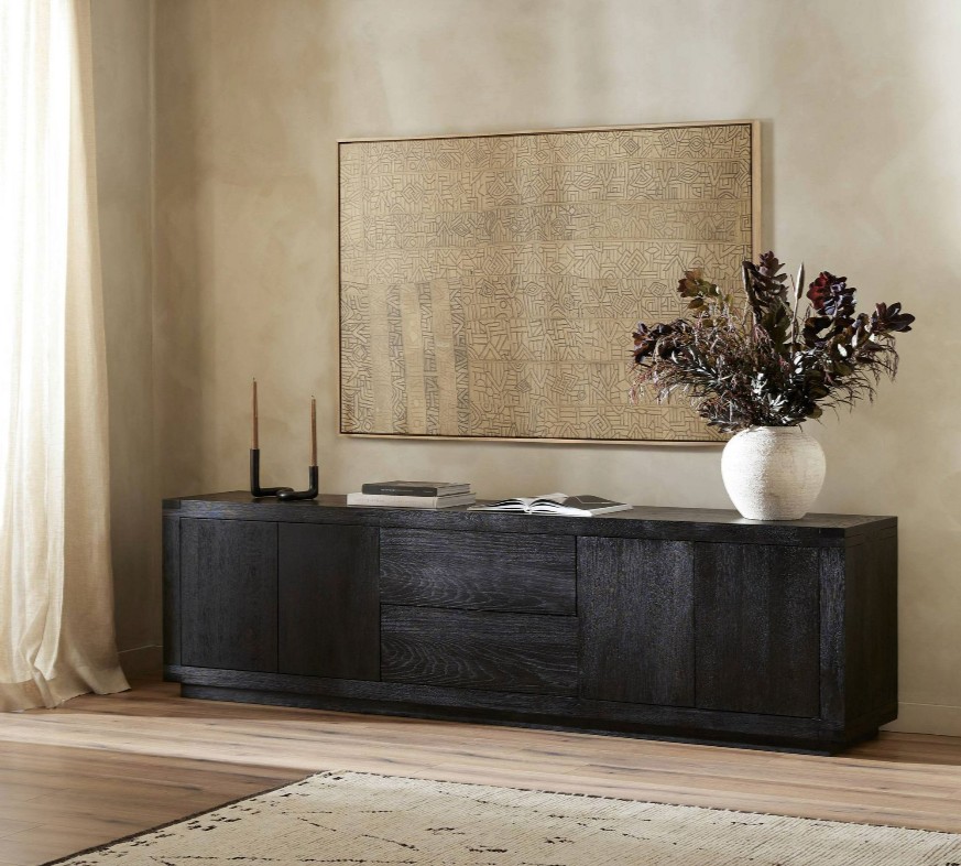 a black wooden tv stand for large tv or media console with decorations on top