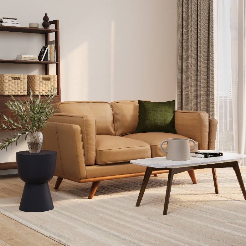 a leather loveseat with green cushion near a low coffee table and a shelf in a compact living room