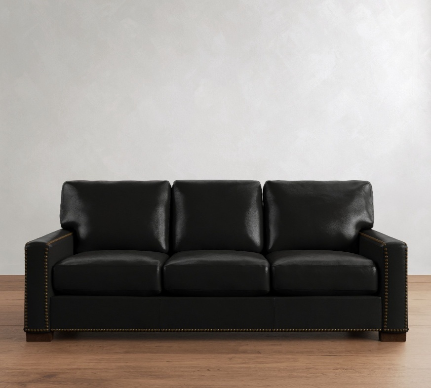 a black leather sofa in mid-century style for modern living rooms