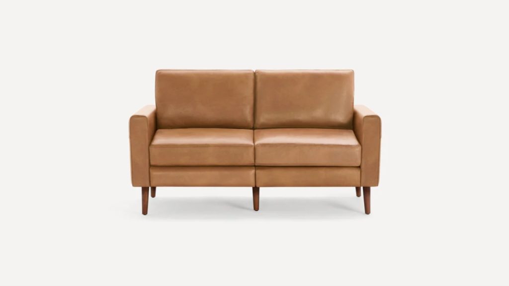 a small brown leather 2 seat sofa for a compact living room