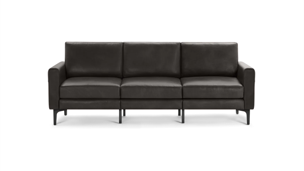 a black leather sofa in mid-century style for modern living rooms
