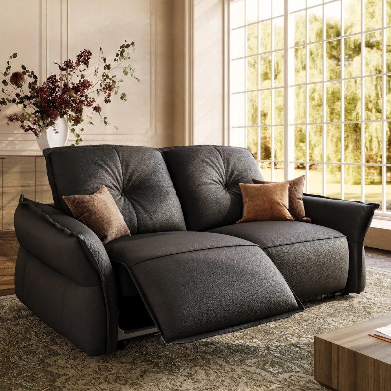 POVISON Marlowe-Dual Power Reclining black leather Loveseat in a cozy and bright living room