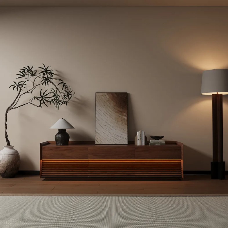a brown mid-century tv stand with storage and decorations on top in a warm color living room