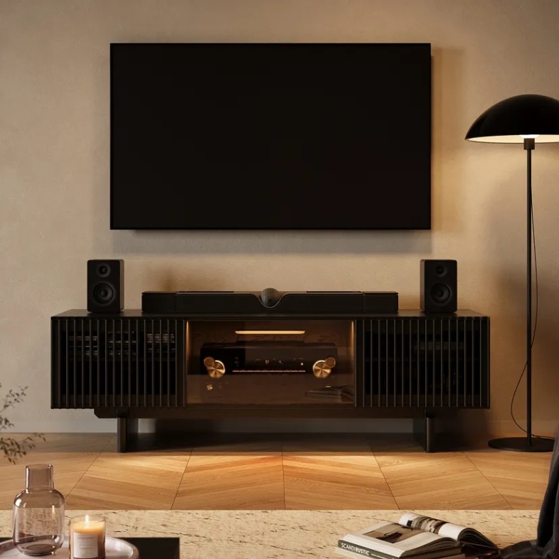 POVISON Arboren 71” Mid-Century Modern Black TV Stand with Storage for media and soundbars on top near a black floor lamp and a mounted tv in a warm and modern living room