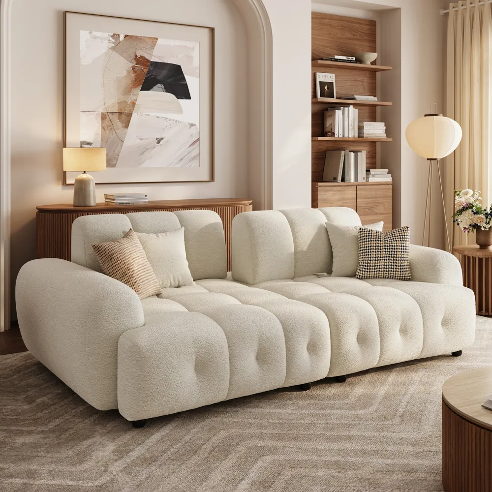 Cream chenille sofa styled in a warm, pet-friendly living room.