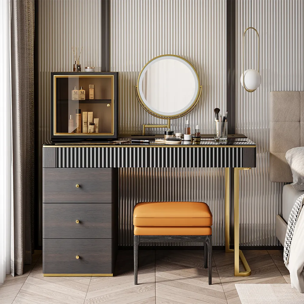 A smoky mid-century vanity with an LED mirror, stool, and organized drawers set beside soft bedroom lighting and neutral bedding.