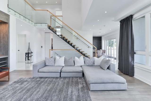 Bright neutral contemporary living room with sofa and natural light showing what Is Contemporary Design.