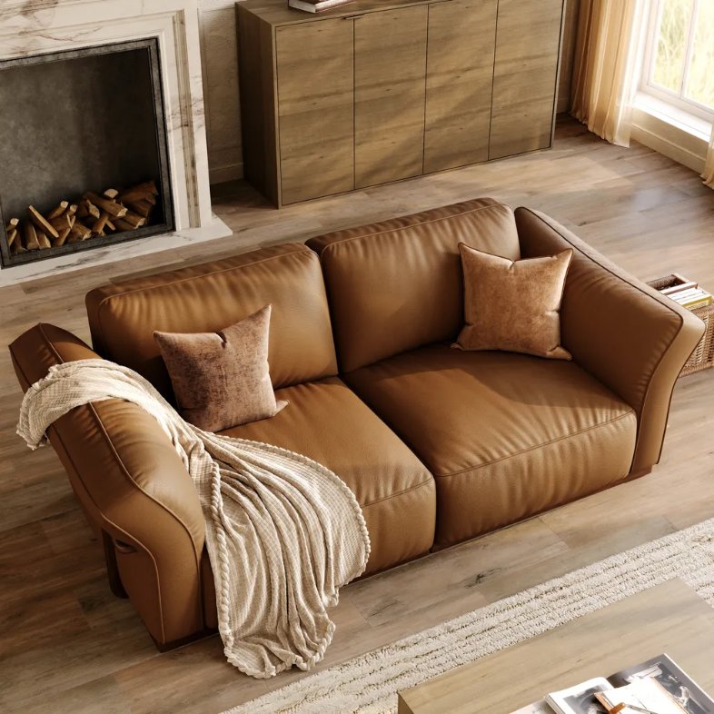 Povison Cronus-Brown Genuine Leather Modular Sofa with Solid Wood Frame near a fireplace and rectangular wood coffee table in a cozy and bright living room