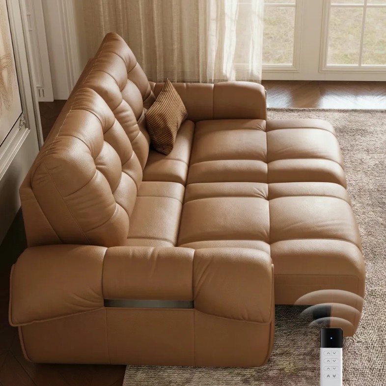 POVISON Cygnus-Power Sofa Bed in a vintage style on a carpet against the wall with a mounted painting in a bright living room