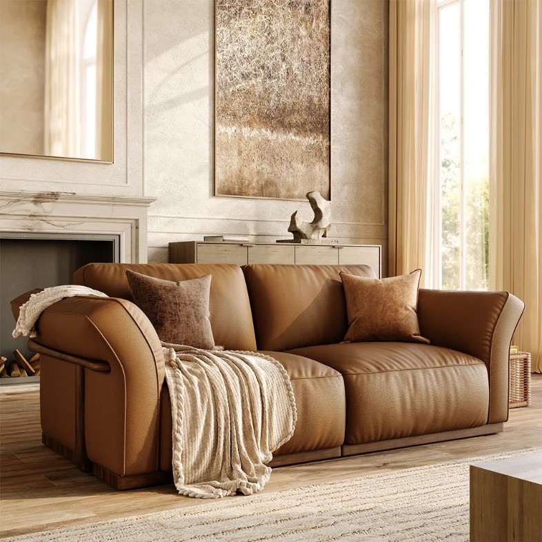 POVISON Cronus Brown Genuine Leather Modular Sofa in a vintage mood with cushions near a rectangular wood coffee table and a fireplace in a bright and mid-century living room