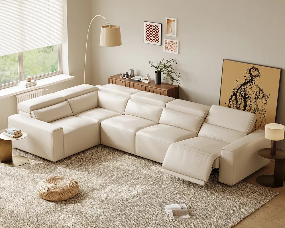 POVISON Benjamin L Shaped Power Reclining Sofa near round side tables and a shelf in a bright and cozy living room