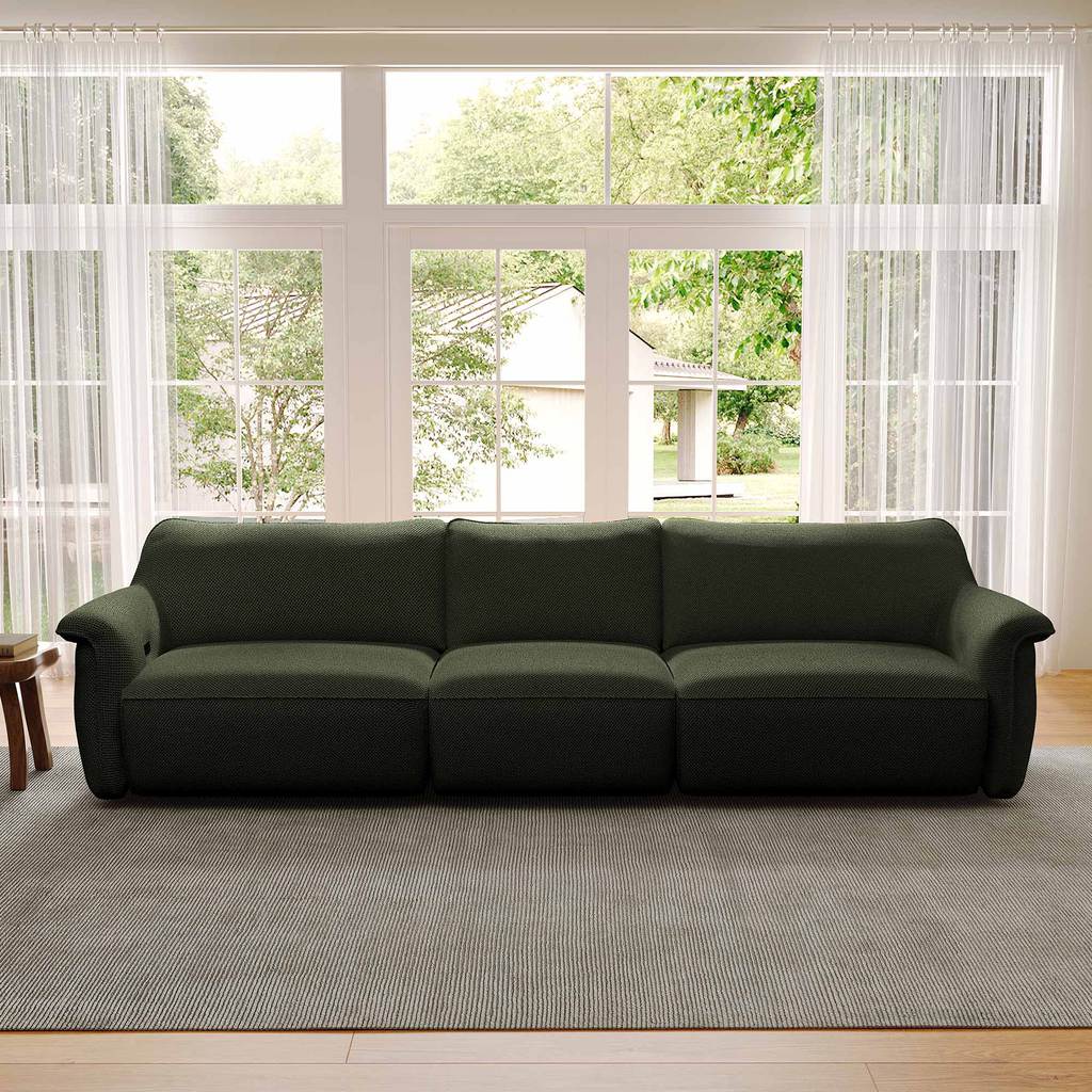 Eureka Ergonomic Vero Power Sleeper Sofa near an accent chair near a window in a bright and modern living room