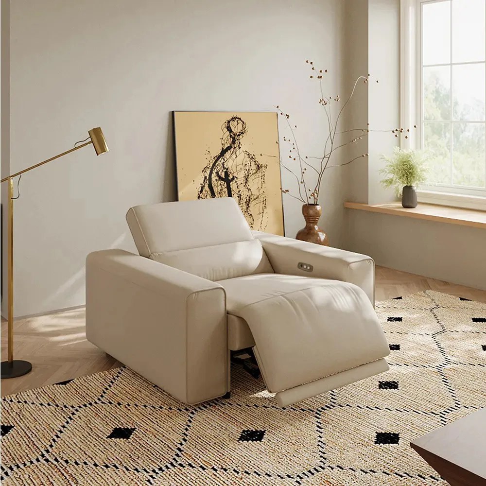 Benjamin-48" Leather Recliner Chair with Adjustable Headrest near a floor lamp, a painting and a plant in a bright and cozy living room
