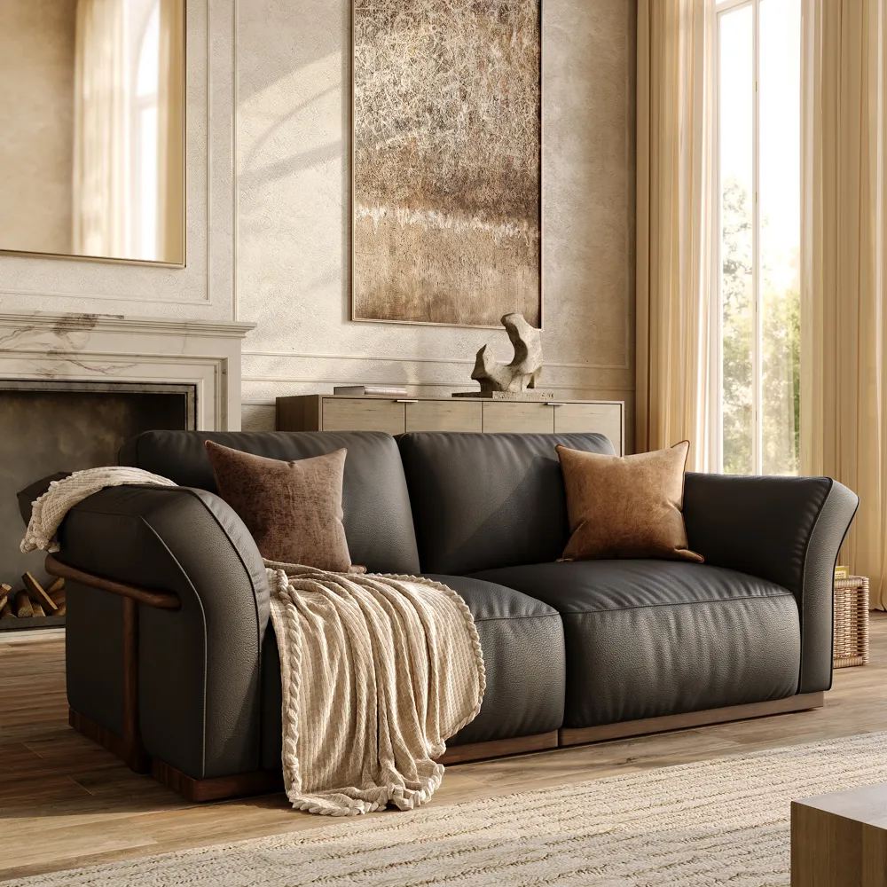 POVISON Cronus Modular Sofa in black leather with cushions near a rectangular wood coffee table, a wood shelf and a fireplace in a mid-century living room