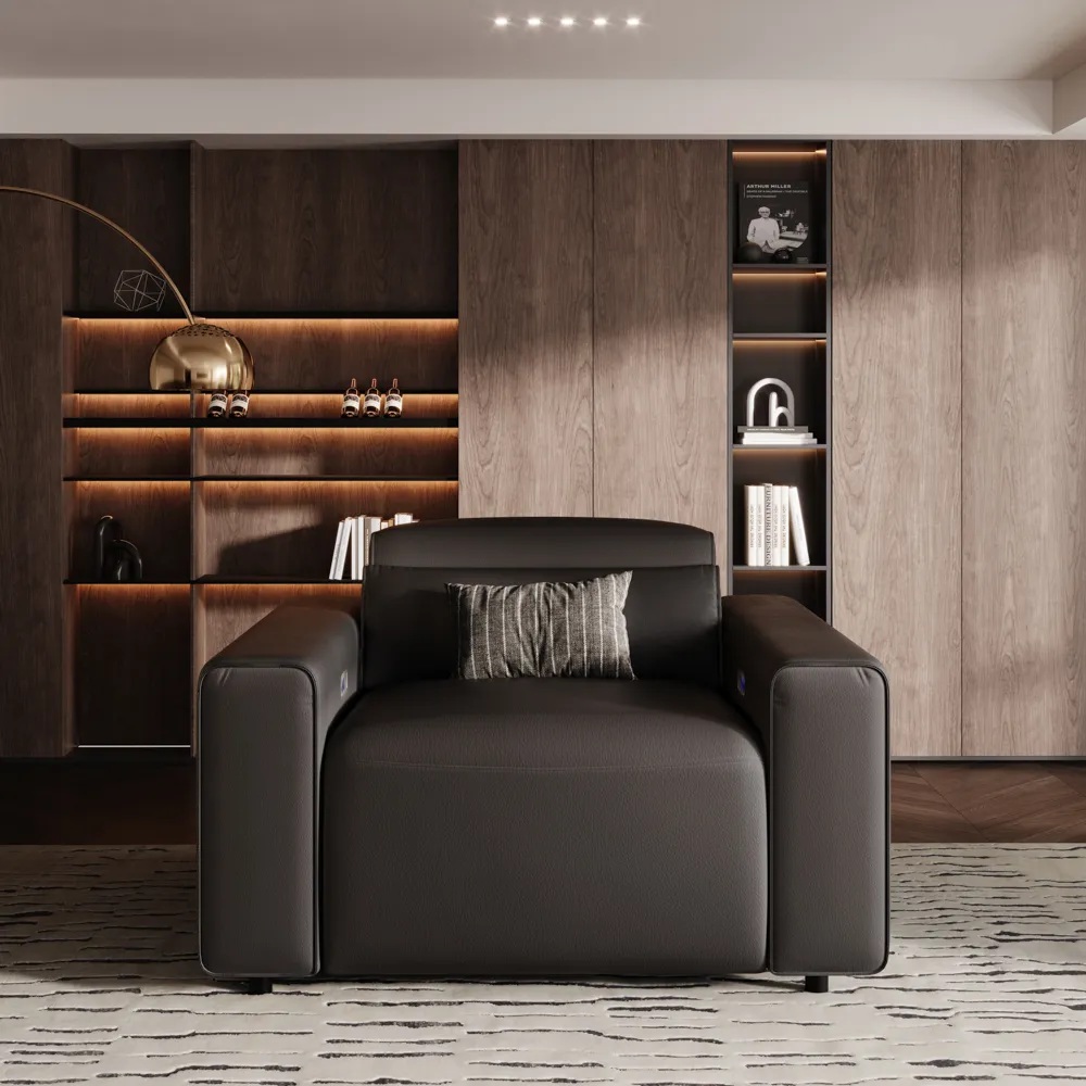 Benjamin-Power black Recliner with square arm and cushion in a mid-century modern living room in front of a shelf with books and decorations