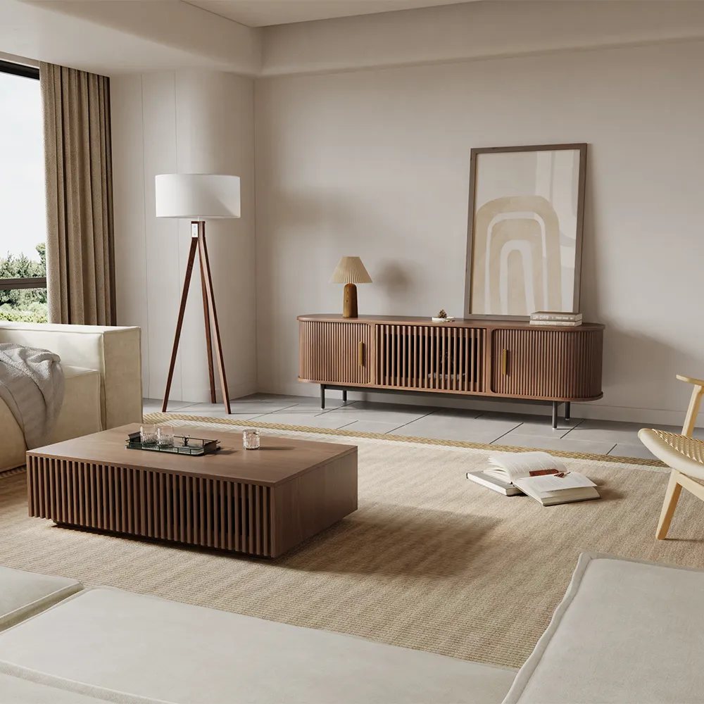 Eos-71" Tambour Door TV Stand with storage and a lamp, a painting and some book on top in a modern farmhouse living room near a rectangular wood coffee table, an accent chair and a sofa with square arms