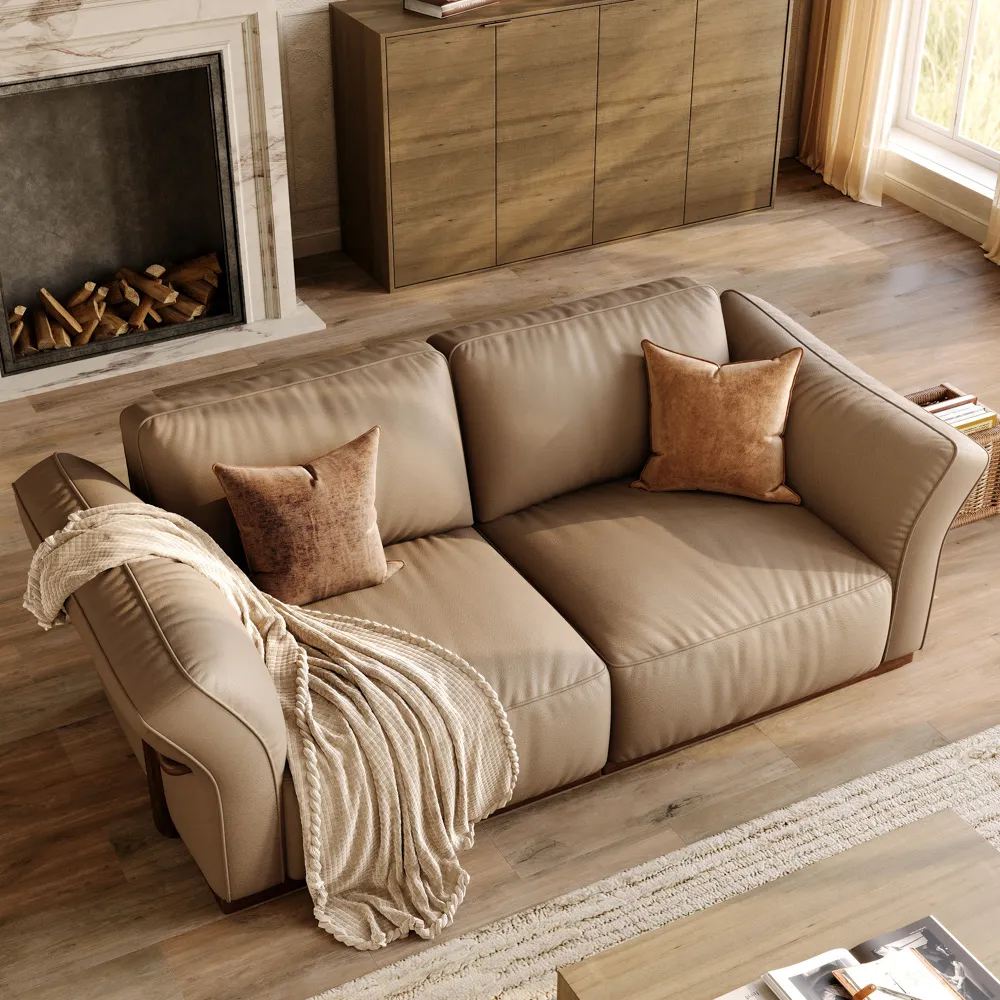 Cronus-Khaki Genuine Leather Modular Sofa near a rectangular wood coffee table, a wood console table and a fireplace in an organic modern living room