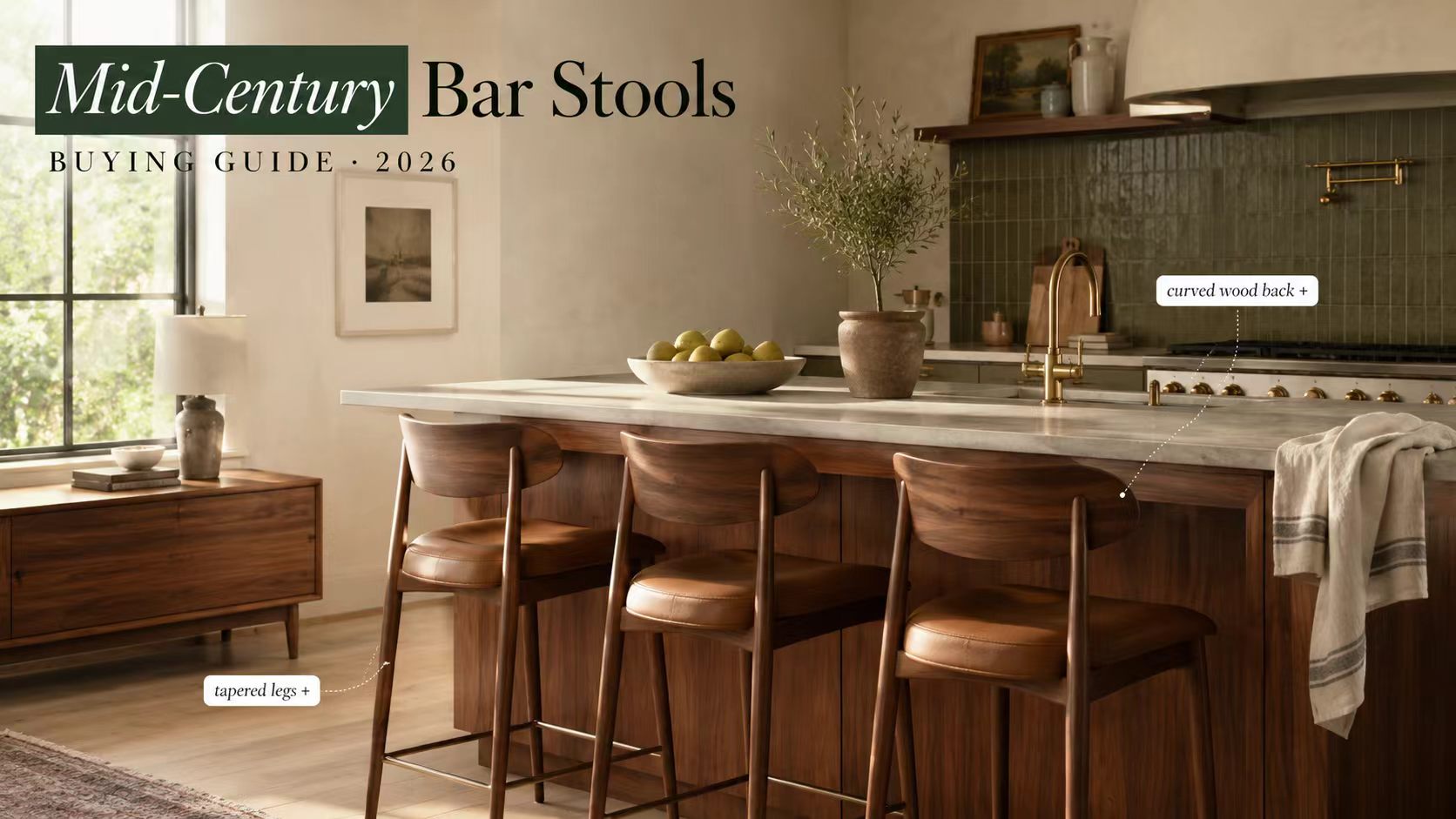 Three mid-century bar stools with curved wood backs and tapered legs lined up at a modern kitchen island.