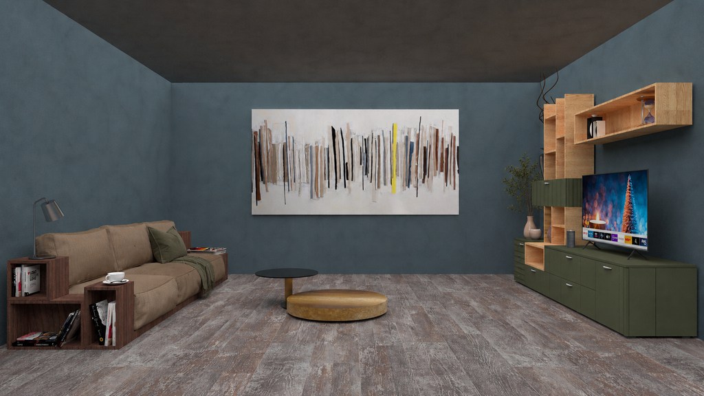Modern living room with blue-gray walls, beige sofa, abstract wall art, and an olive green TV cabinet paired with light wood shelving and subtle green accents.
