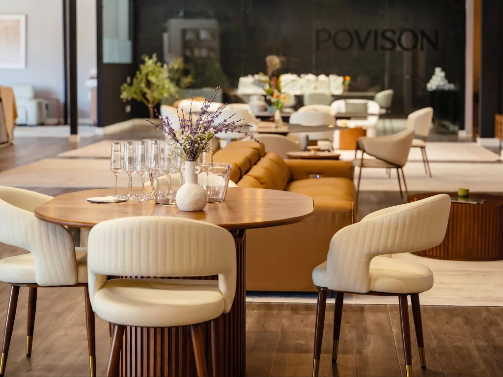 Classic dining table product in Povison's furniture store in LA