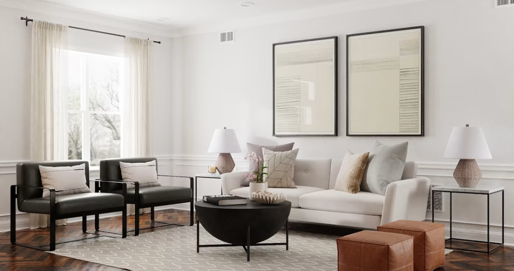 Bright apartment living room featuring a cream loveseat sofa for small spaces and dark minimalist armchairs.