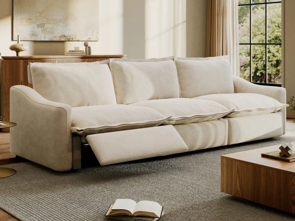 Povison Ergopals-Power Reclining Sofa with an extended footrest, oversized cushions, and a large gray rug in a warm modern living room.