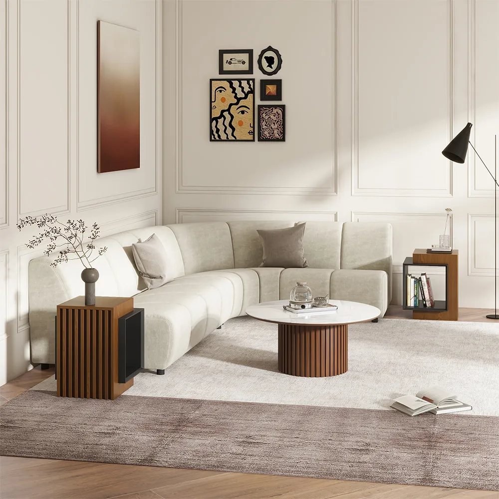 a white and minimalist living room with a white sofa, a round marble-top coffee table and two wood side tables