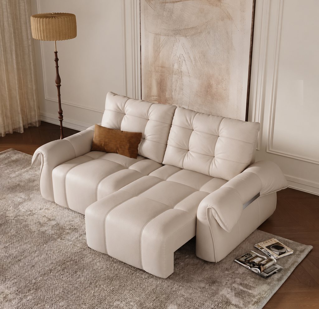 Cream power sleeper sofa with an extended seat in a warm neutral living room