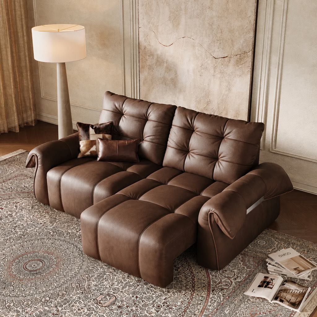 Dark brown reclining sectional sofa with extended footrests, accent pillows, and a floor lamp in a warm traditional living room.