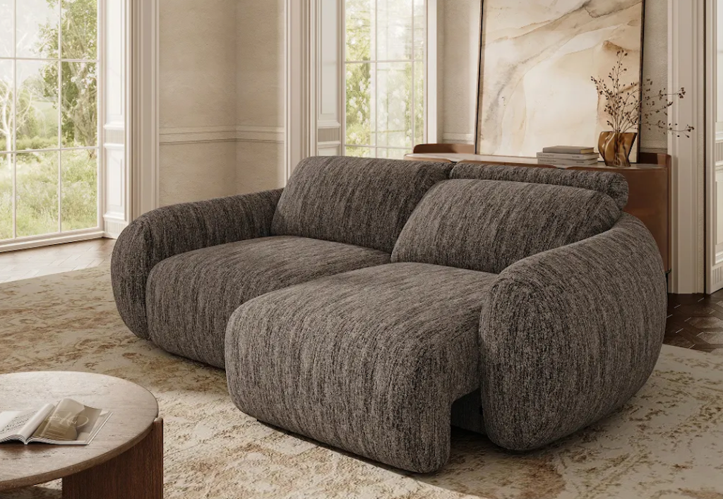 Sleek grey fabric modern accent chairs featuring a unique wrap-around backrest and thin black minimalist legs.