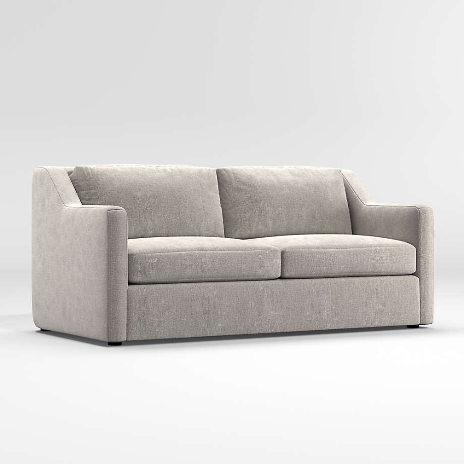 Light gray two-seat sleeper sofa with loose cushions and slim track arms on a white background