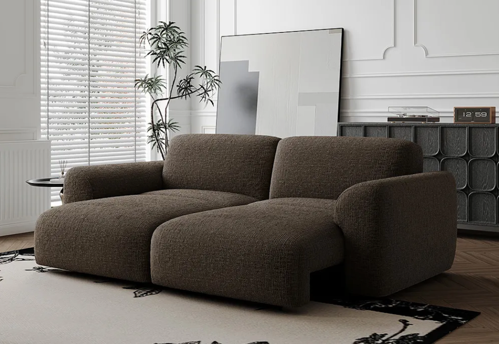 Elegant olive green textured modern accent chairs adding a stylish pop of color to a minimal home library setting.