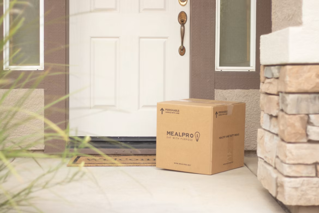 A delivery box on a concrete doorstep used as a key marker to describe a spatial measurement path.