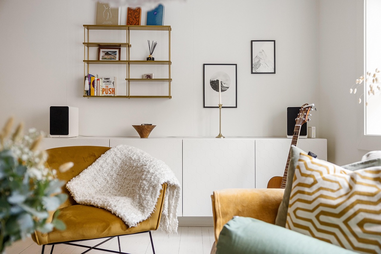 Living room with console cabinet and shelving matched to room decor