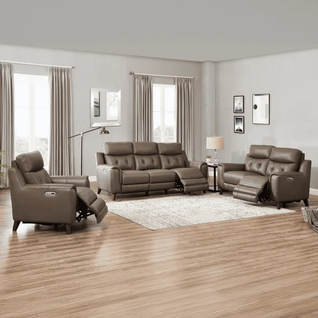 Gray leather power reclining sofa, loveseat, and chair arranged in a bright modern living room