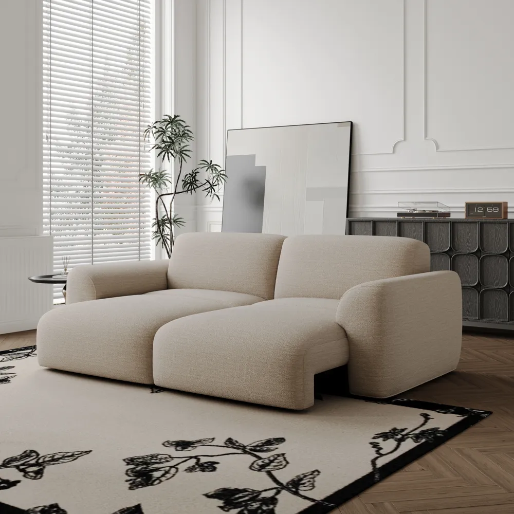 Cream modular sofa with extended seats in a bright living room.