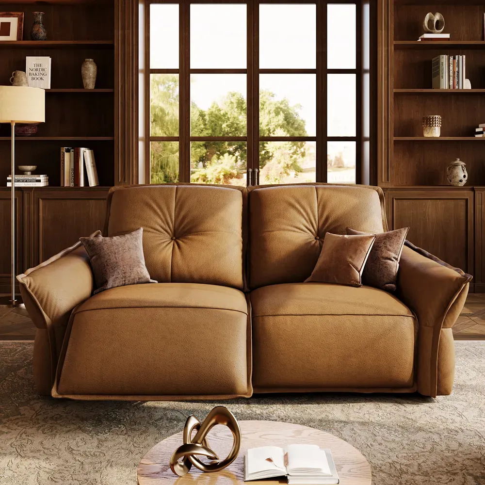 POVISON Marlowe leather reclining loveseat with tufted back cushions and curved padded arms in the closed position.