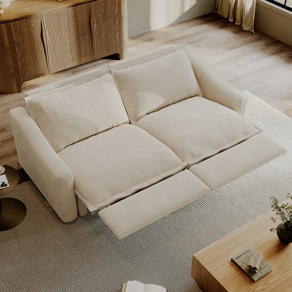 Cream power sofa bed with two extended deep seats for spacious supportive lounging.