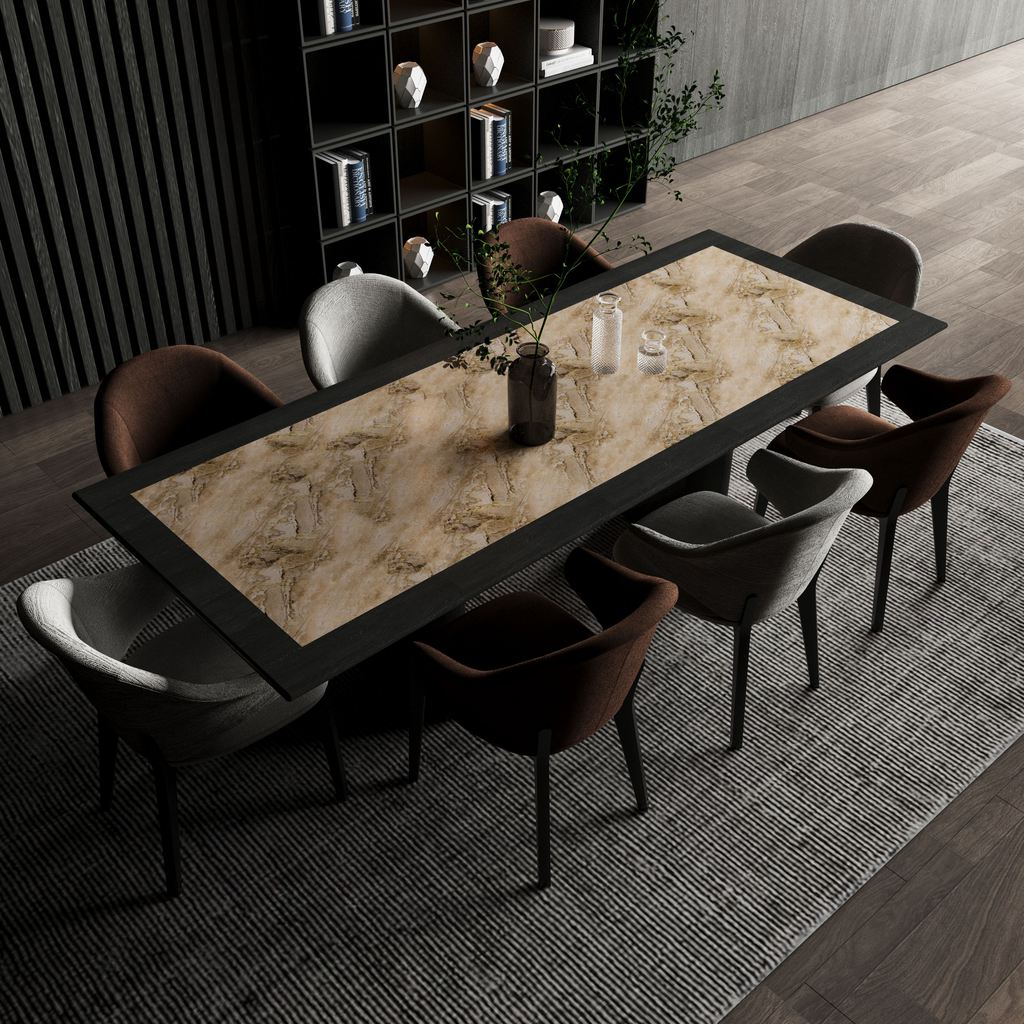 Rectangular designer dining table with a stone-look top, black frame, and eight upholstered chairs in a modern dining room.