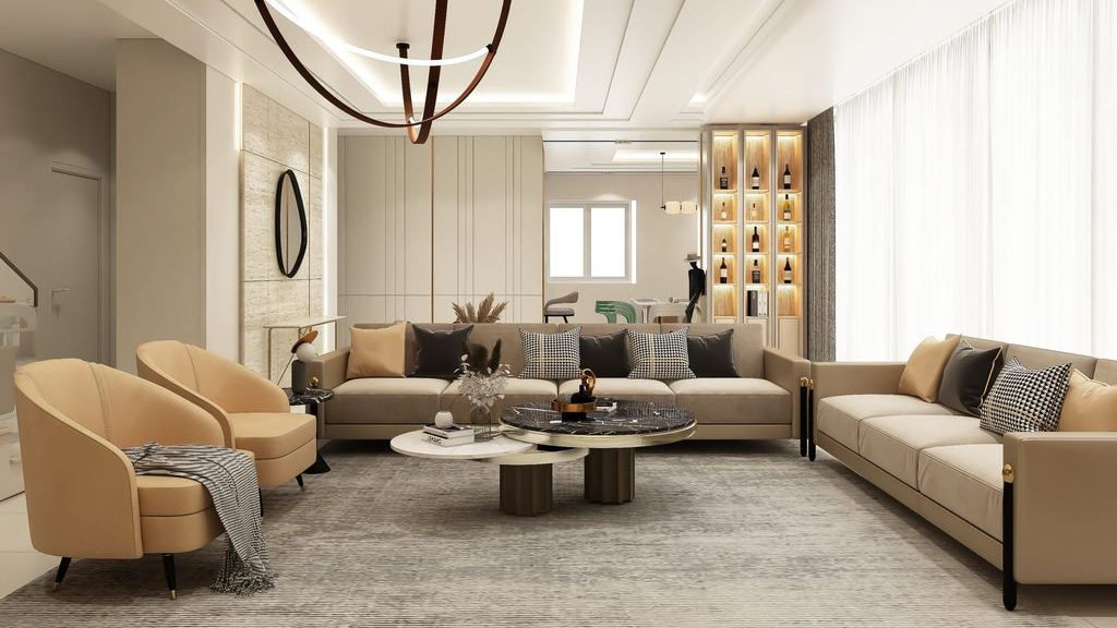 Two beige sofas and two curved accent chairs arranged around round coffee tables in a spacious modern conversational living room.