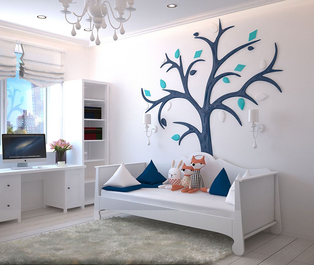 White daybed in a bright kids’ room with a desk, plush toys, and tree wall art.