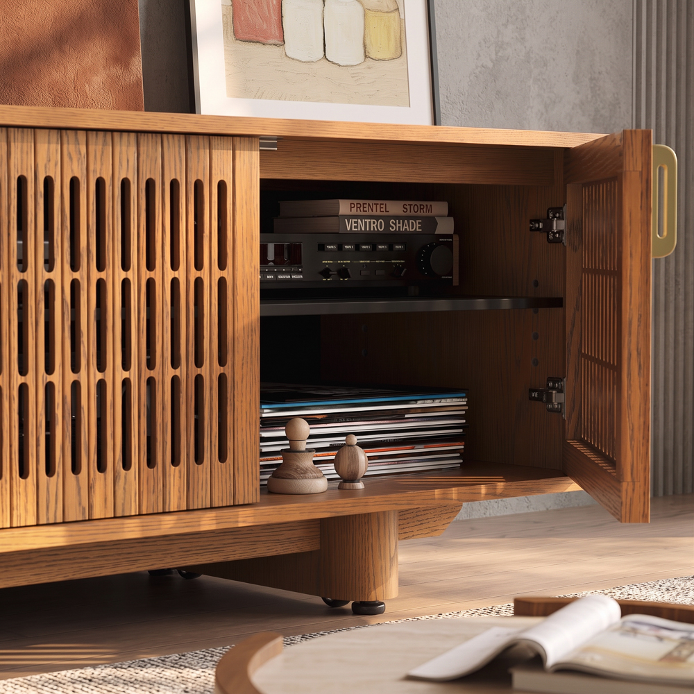 Close-up of a wooden media console with ventilated doors, AV receiver, adjustable shelf, and hidden entertainment storage.