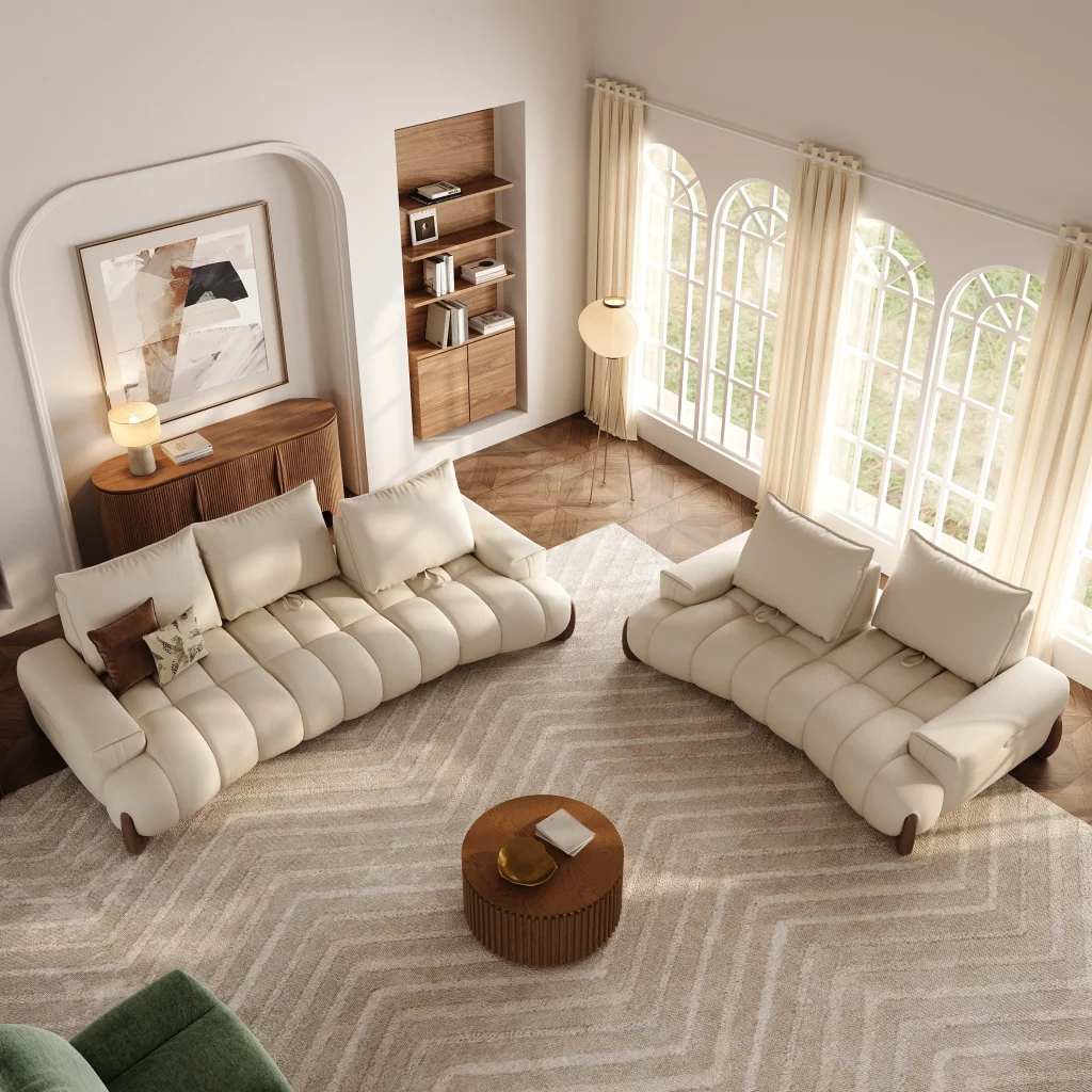 Warm neutral living room with cream sofas, walnut furniture, large windows, and layered natural textures