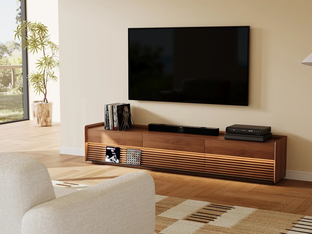 Modern neutral living room with walnut TV stand, wall-mounted TV, and organized entertainment setup